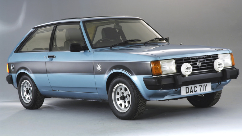 The Sunbeam Lotus in blue with black stripe, front 3/4 view