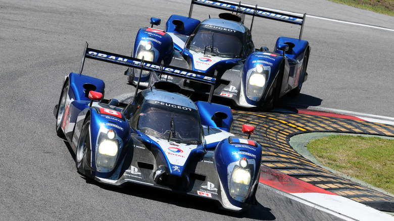 Two Peugeot 980 HDi FAP prototypes driving on a track