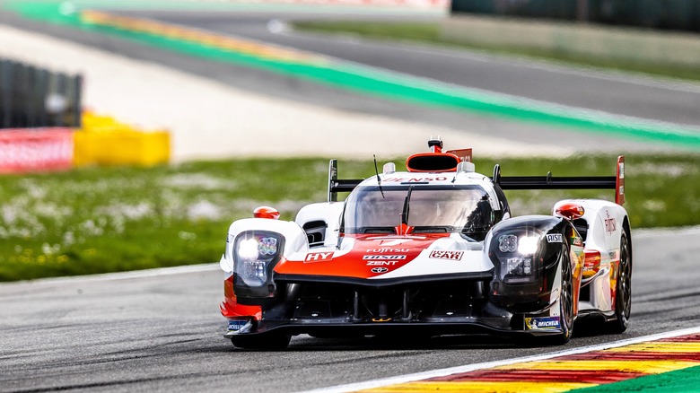 Toyota GR010 hypercar driving on a track