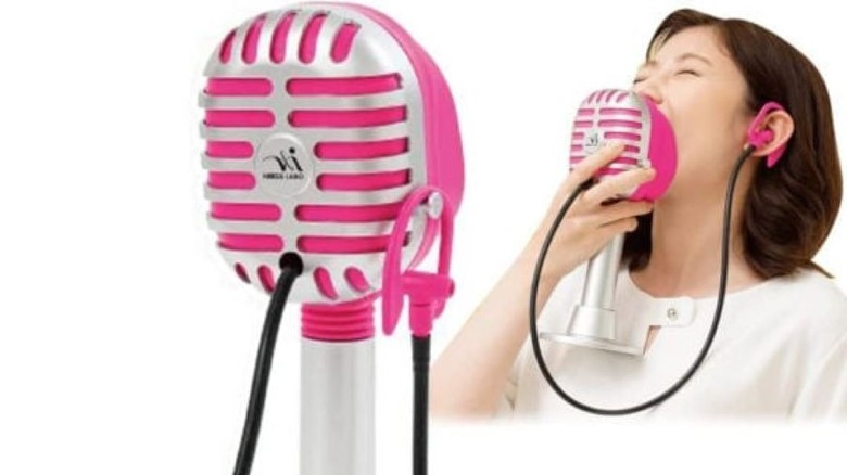 Silent karaoke exercise microphone in use