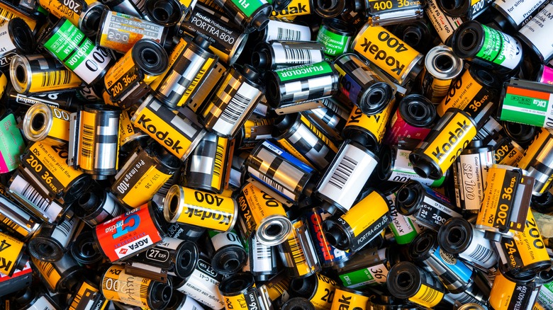 35mm film cannisters in a pile