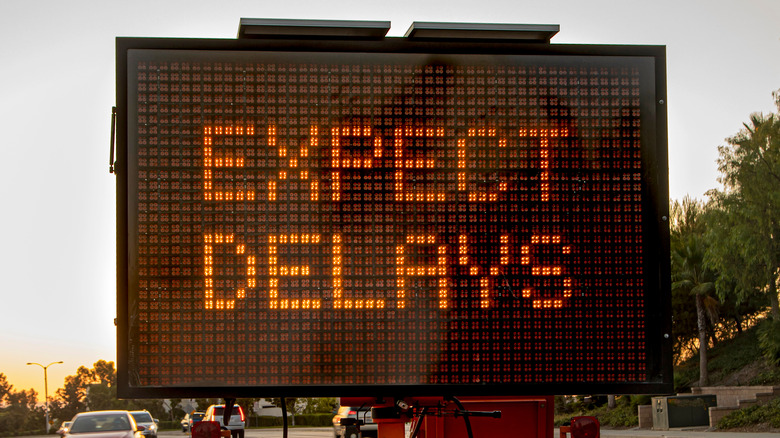 Expect delays road work sign
