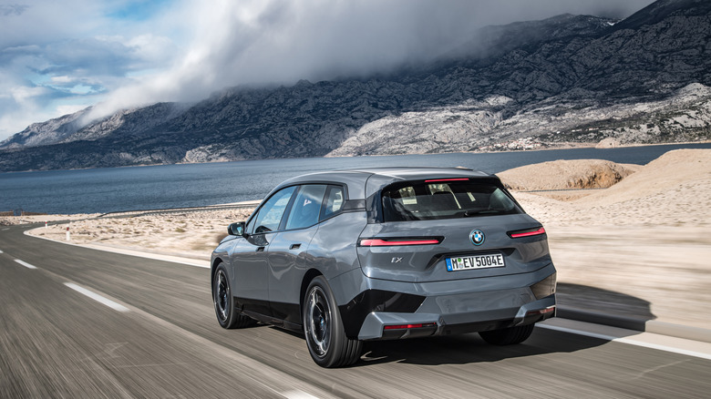 BMW iX braking into a curve