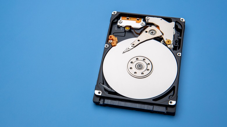 A hard drive against a blue background
