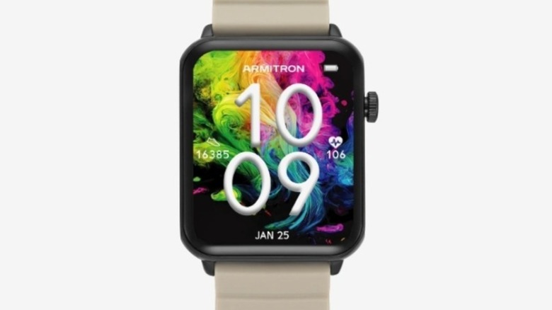 Colorful smartwatch display with a tan wristband