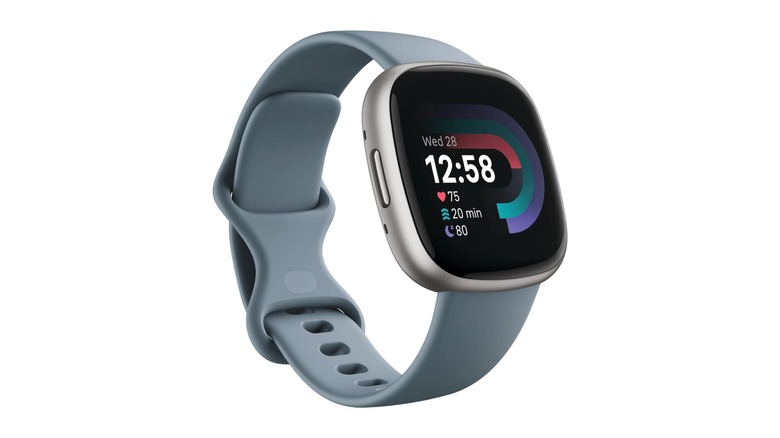 Light blue smartwatch with a black and colored display