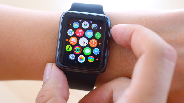 Smartwatch face showing colorful apps