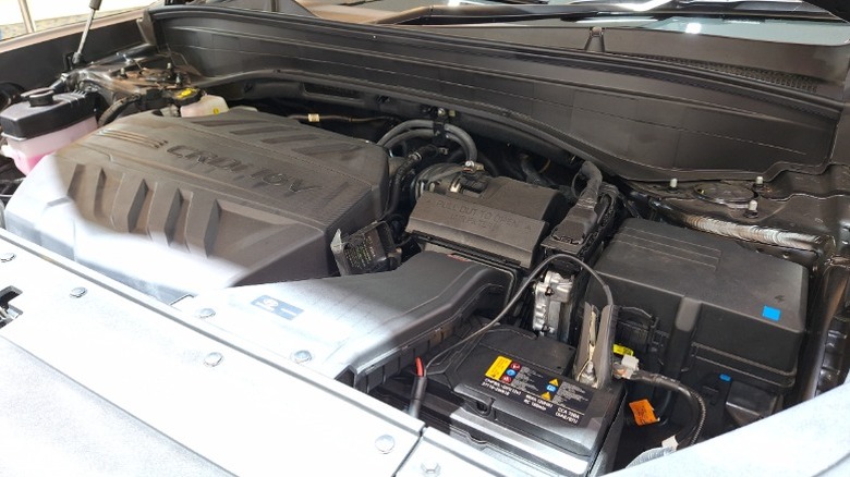 a Hyundai CRDI engine under the hood of a car.