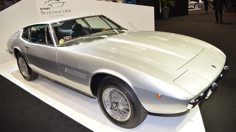 A Maserati Ghibli in a showroom