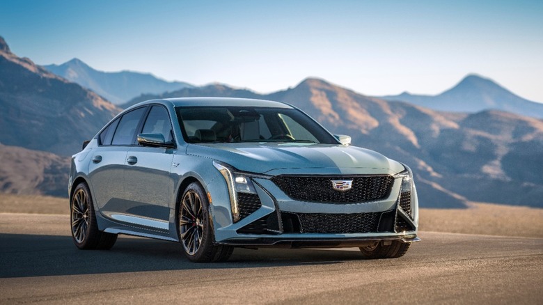 The Cadillac CT5-V Blackwing in bluish gray, front 3/4 view