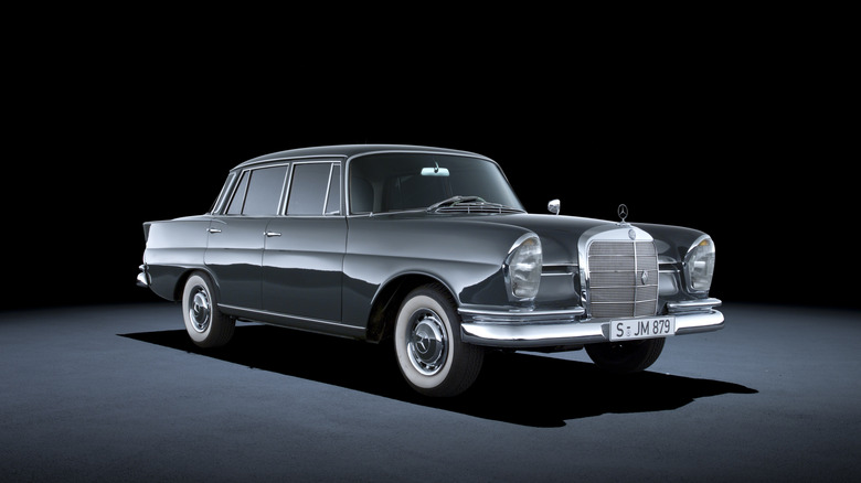 Black 1959 Mercedes-Benz W111 front 3/4 studio shot