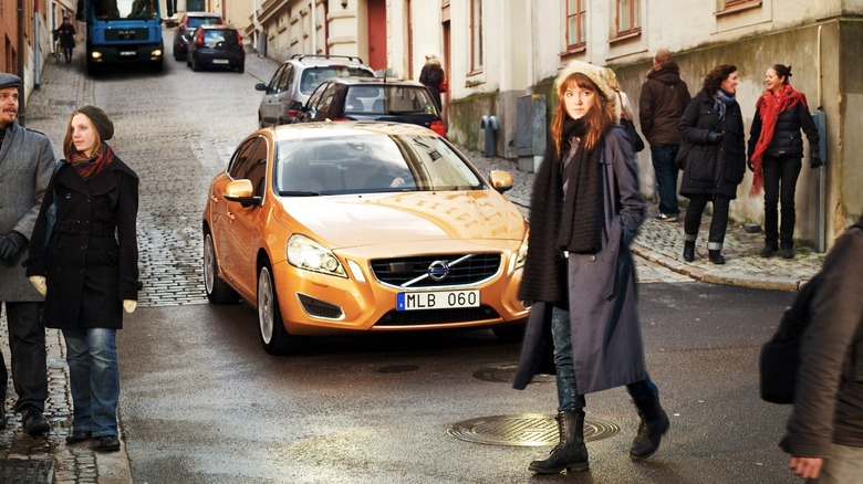 Volvo showcases pedestrian detection feature with an S60 sedan in urban streets