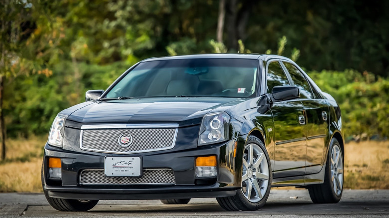 A black first generation Cadillac CTS-V, front 3/4 view