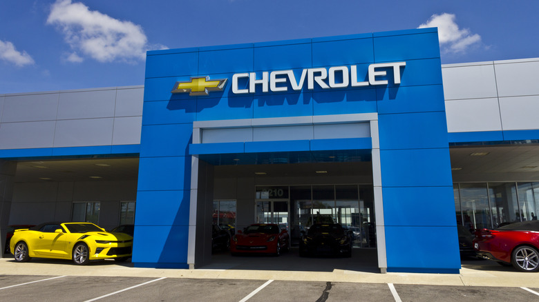 Chevrolet dealership with parked cars