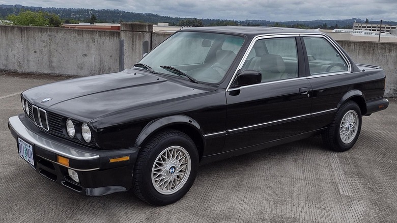 Black BMW 325is in a parking lot