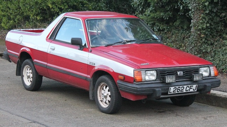 Red Subaru BRAT parked on the street