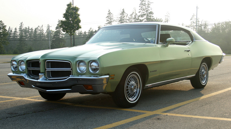 Pontiac LeMans in parking lot