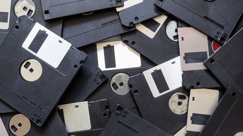 Many black floppy disks