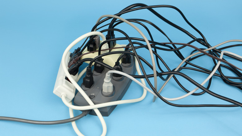 Extension cord overloaded with plugs