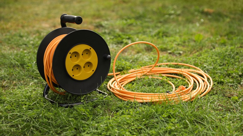 Extension cord reel on grass