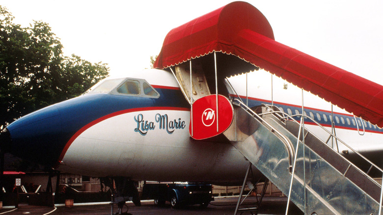 Lisa Marie plane with red awning cover over stairs