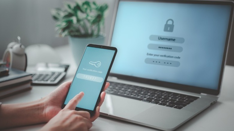 a laptop and phone showing how two factor authentication works