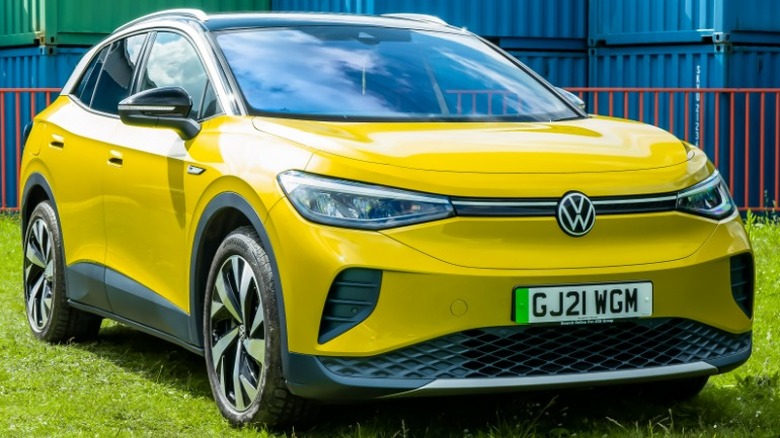 yellow Volkswagen ID.4 on the grass