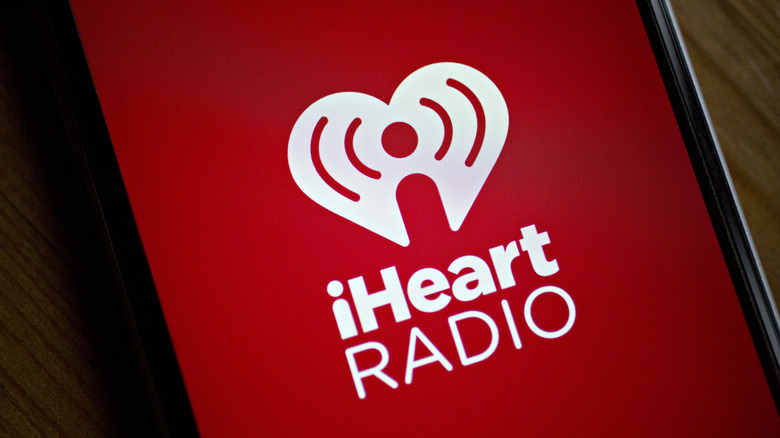 iHeartRadio logo displayed on a smartphone