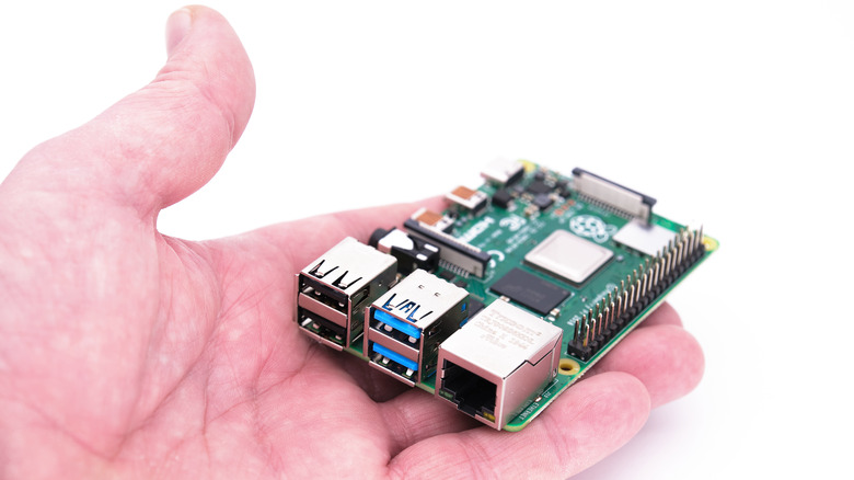 Hand holding Raspberry Pi