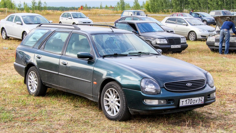 Ford Scorpio parked in field