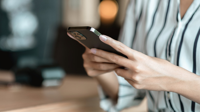 Person looking at smartphone