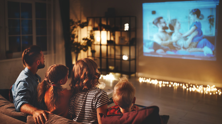 Family watching TV together