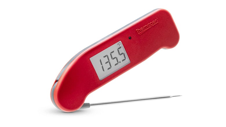 Red digital meat thermometer reading 135.5 degrees