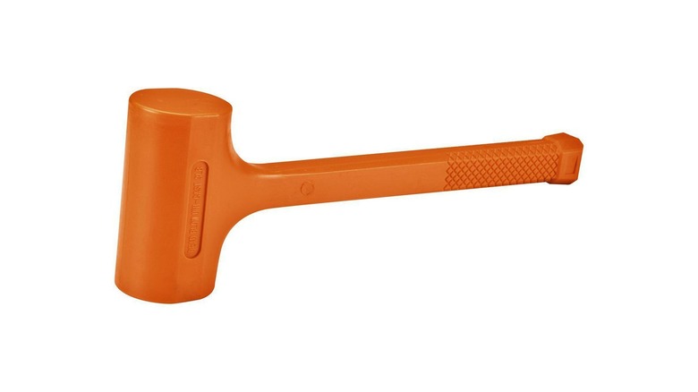 an orange dead blow hammer