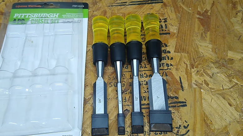 Set of chisels next to open packaging