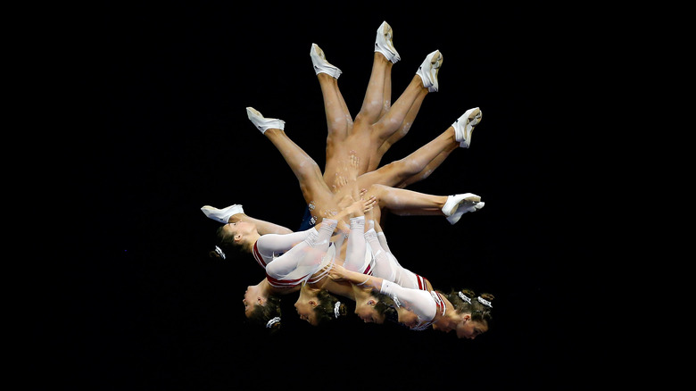 Multiple-exposure image of gymnast