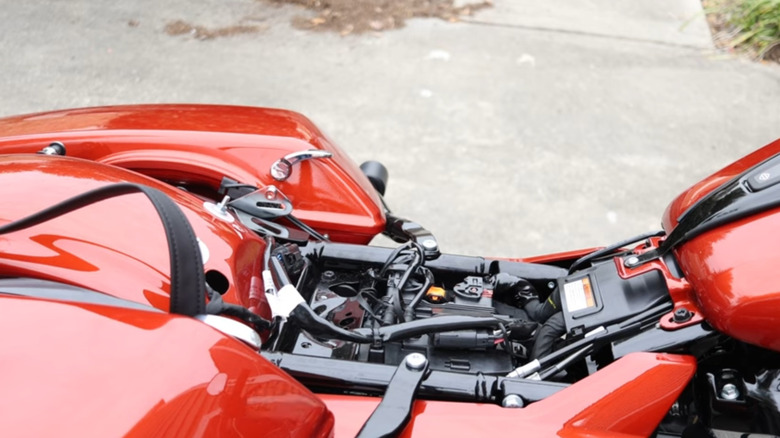 view of compartment beneath the seat of a Road Glide