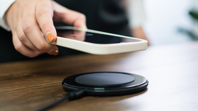 A smartphone on a wireless charger