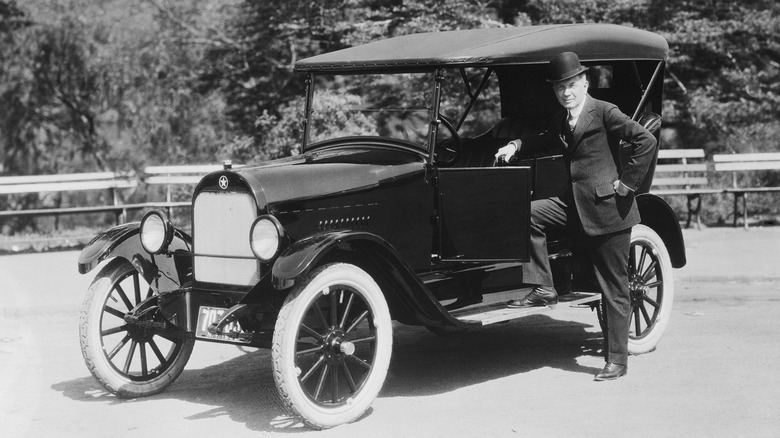 William Durant with early automobile