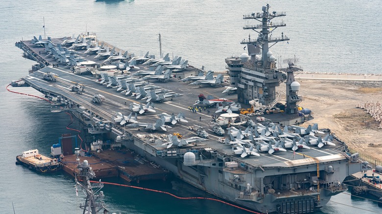 A Nimitz aircraft carrier docked