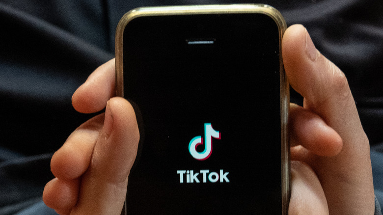 TikTok opening on a phone