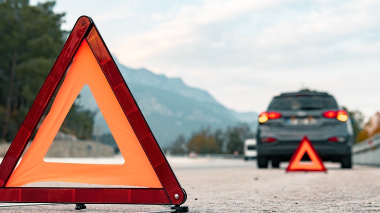 A reflective triangle behind a vehicle