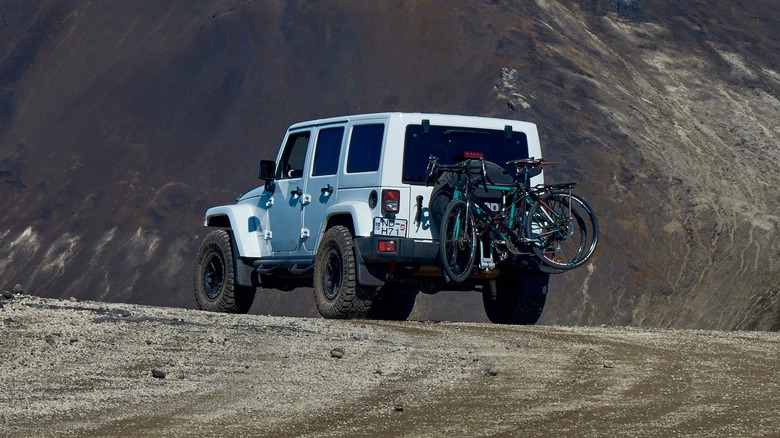 White Jeep wrangler with bike racks