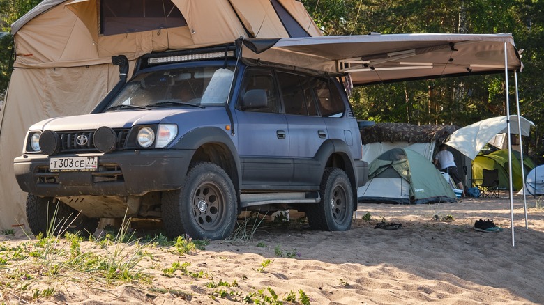 SUV with attached awning