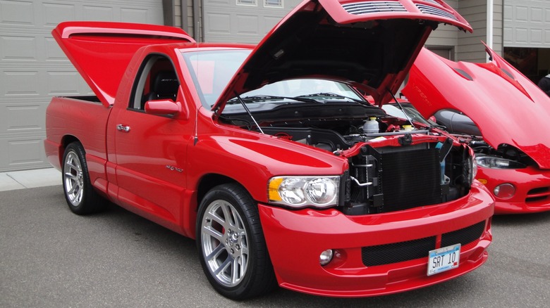 Red 2005 Dodge Ram SRT-10 parked with hood open