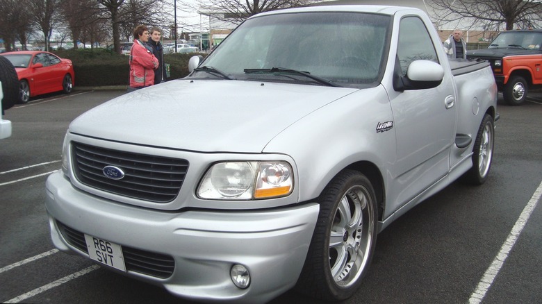 Silver 2001 Ford F-150 SVT Lightning parked