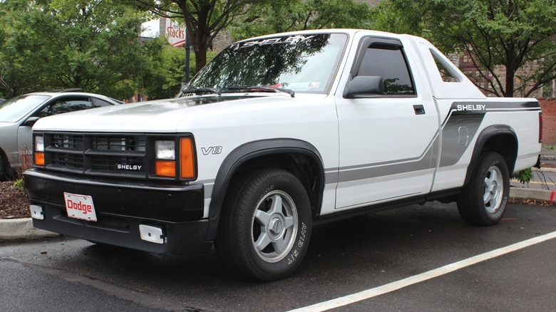 White 1989 Shelby Dakota parked