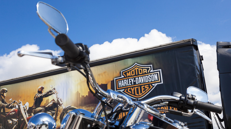 Harley Davidson logo behind bike handlebars