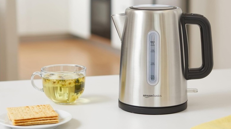 Electric tea kettle on kitchen counter.