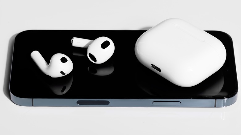 AirPods atop an iPhone